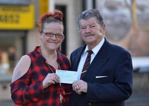 Anne-Marie McMeekin with retired businessman  Jimmy Simpson who has offered to replace the stolen money.