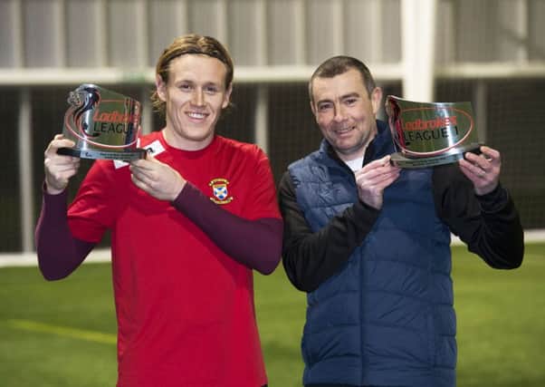 East Fife manager Barry Smith is presented with the Ladbrokes League 1 Manager of the Month award for December and player Jonathan Page is presented with the Ladbrokes League 1 Player of the Month award along with defender Jonathan Page who won the player of the month prize. Pic by SNS.