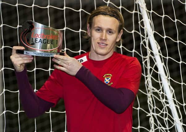 East Fife's Jonathan Page is presented with the Ladbrokes League 1 Player of the Month award. Pic by SNS.