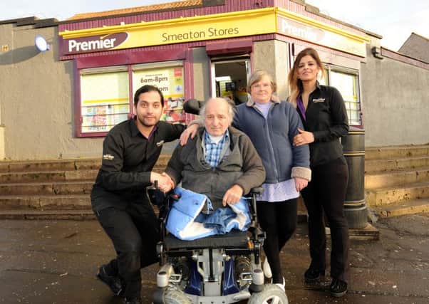 Shopowner Asif Akhtar, Dick and Janet Sneddon and Abada Akhtar at Smeaton Stores (Pic by Fife Photo Agency)