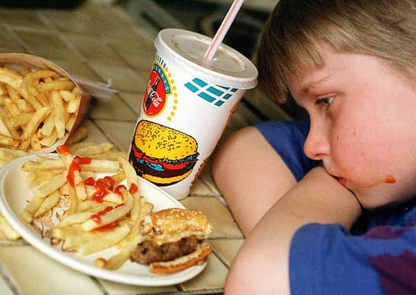 The report reveals  new figures showing 27 per cent of children in Scotland are overweight or obese. Pic: Graham Hamilton/TSPL