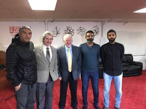 Pictured at the charity dinner, from left are: Maz Salim, Roger, Craig Brown, Ashar Salim and Amir Salim.