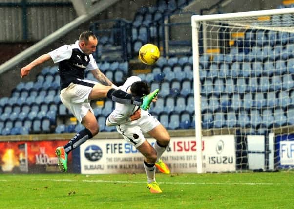Mark Stewart in action against Dumbarton - credit - Fife Photo Agency
