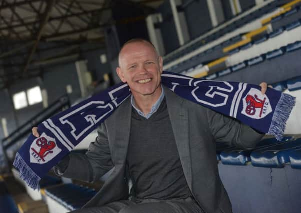 John Hughes parades a Raith scarf at his official unveiling last Friday. Pic: George McLuskie