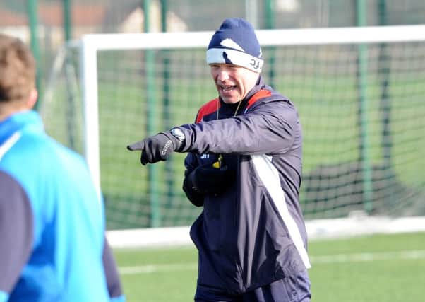 John Hughes points the way in one of his first training sessions as Raith manager. Credit- Fife Photo Agency