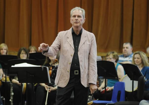 Composer and conductor Bruce Fraser, pictured at a musicians' play day he organised at Buckhaven High School last year for present and past staff and pupils.