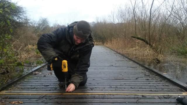 Previous SRUC student Tom Cole on his SNH placement.  He is pictured at Loch Leven National Nature Reserve.