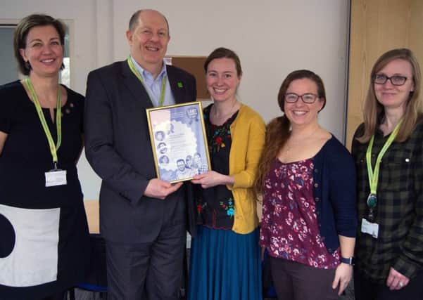 Staff from Barnardo's Scotland with the award