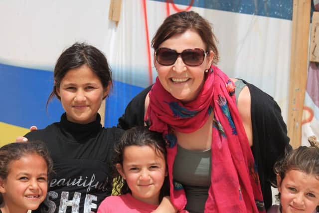Donna with some of the refugee children in the Bekkaa Valley in Lebanon.