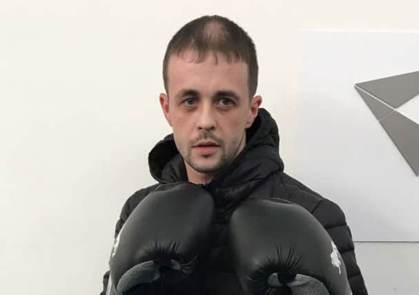 David Penman puts on his boxing gloves for a worthy cause