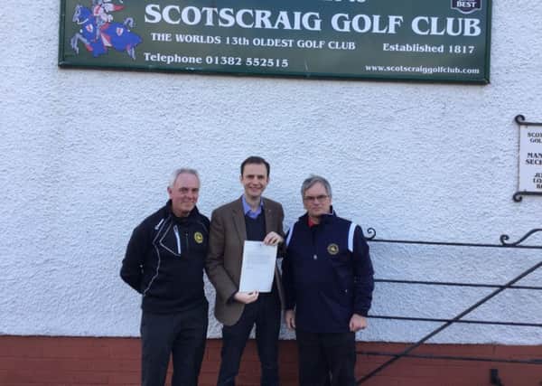 Scotscraig Golf Club captain John Rankin, Stephen Gethins MP and Scotscraig vice captain George Anderson.