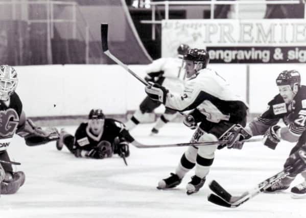 Fife Flyers v Guildford Flames, 2000, Steven King goes for goal. Jamie Organ is the netminder, and right is Karry Biette  (Pic: Ian Alexander)