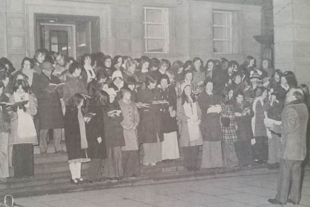 A choir from Kirkcaldy High School on the Town House steps, Christmas Eve 1976