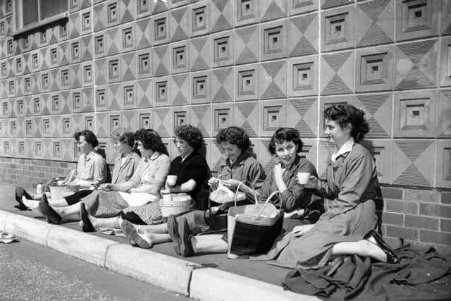 Girls outside one of the Nairn's factory blocks