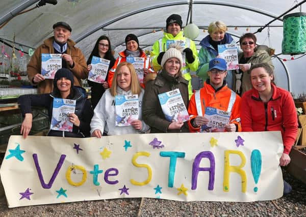 The STAR team urge everyone to vote for the charity (pic: Dave Scott)
