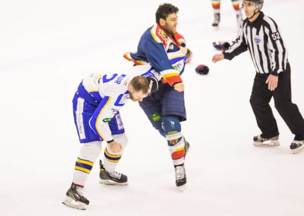 Tommy Muir and Ian Schultz scrap at Murrayfield Ice Rink last Sunday. Pic: Ian Coyle