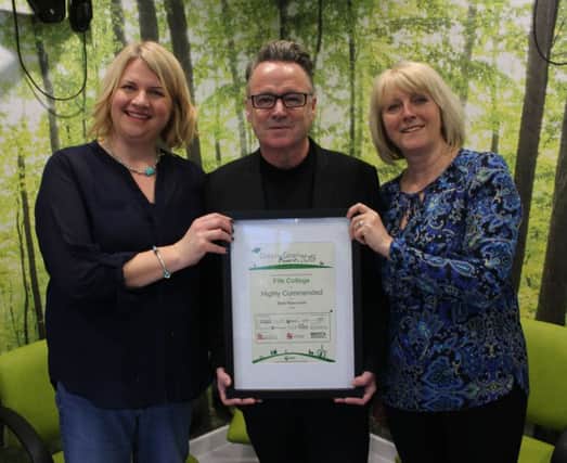 Fife College is showing its support for Earth Hour by hosting a special event on March 25. Fife College staff are pictured previously picking up an award on behalf of the college for its Green Vented Salon, situated at the Halbeath Campus.