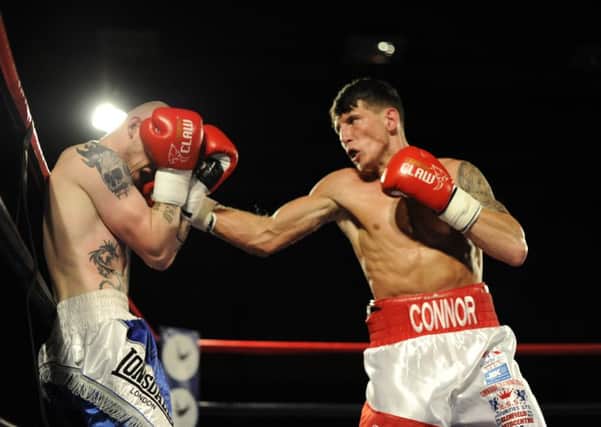 Connor Law in action against Darryl Sharp in May last year. Credit: alanmurrayphotography.co.uk