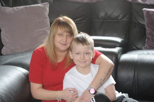 Fife youngster 10-year-old Jay Dalrymple with his mum Lynn McDuff. (Pic George McLuskie).