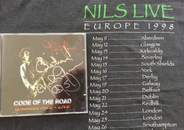 Nils Lofgren, signed Cd and tour t-shirt (Pic: Ritchie Malcolm)
