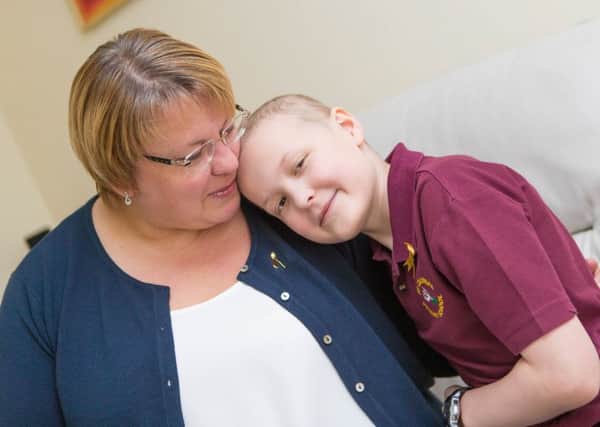Toby pictured with his mum in 2015, a few months after the family received the devastating leukaemia diagnosis