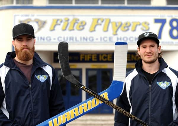 Fife Flyers players Shane Owen (left) and Chase Schaber stand guard at the doors to Fife Ice Arena ahead of the play-off quarter-final against Belfast Giants - credit- Fife Photo Agency