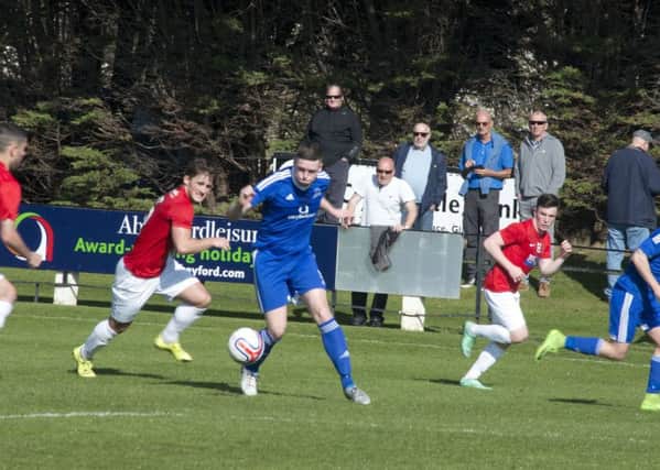 Tayport go on the defensive during the weekend win over St Andrews.