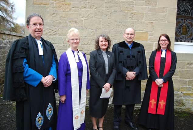 Rev Rosie Frew, third from left is inducted into her new charge at Bowden and Melrose Parish Church.