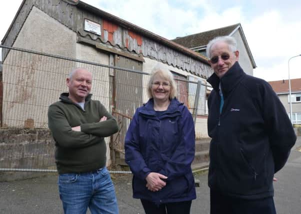 Cardenden Community Forum's Davie Roy, Rosemary Wallace and David Taylor at the derelict building. Pic by George McLuskie