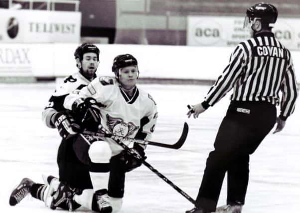 Ted Russell, Fife Flyers with Jesse Hammill (Peterborough Pirates), and linesman Rab Cowan. November 2000