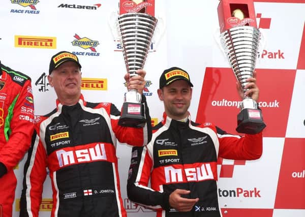 Jonny Adam (right) on the British GT podium with TF Sport team mate Derek Johnston.