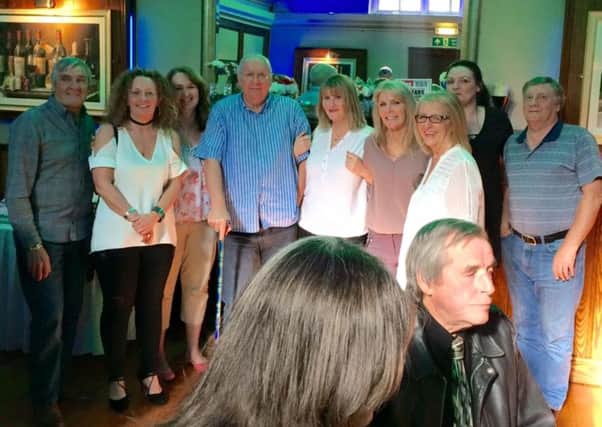 Original owner Drew Nicol with some of his former staff celebrate 25 years of Betty Nicol's