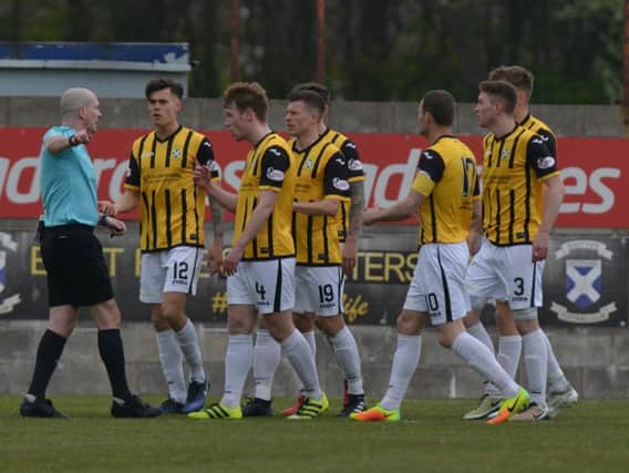 The East Fife players are furious after Chris Kane's sending off. It's a decision the club is appealing. Picture by George McLuskie.