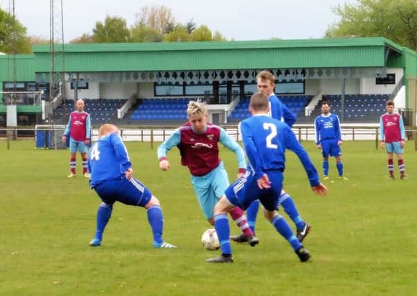 Morgan Dow goes on the attack for Cupar Hearts.