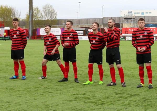 Bowhill players line-up before kick-off in their Scottish Cup semi-final at New Douglas Park, Hamilton.