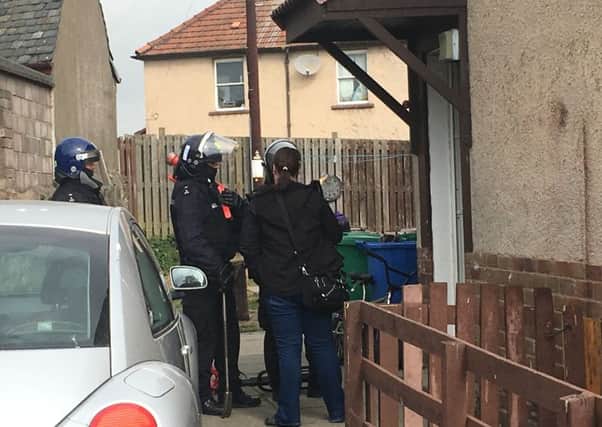 Police charged four people after the search at Melrose Crescent.