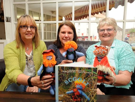 Fiona, Morag and Margaret with their creations and the forthcoming book. Pics by FPA