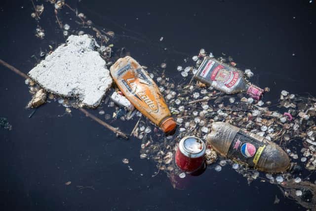 Plastic bottles and other rubbish floating in the Forth