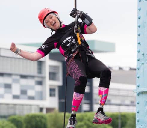 Founder Corrine Hutton takes on the abseil. Pic by Martin Shields