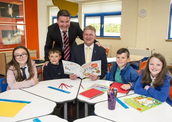 Cowdenbeath pupils join David Torrance MSP and Havelock chief executive David Ritchie to try out the firms new Imagine furniture range