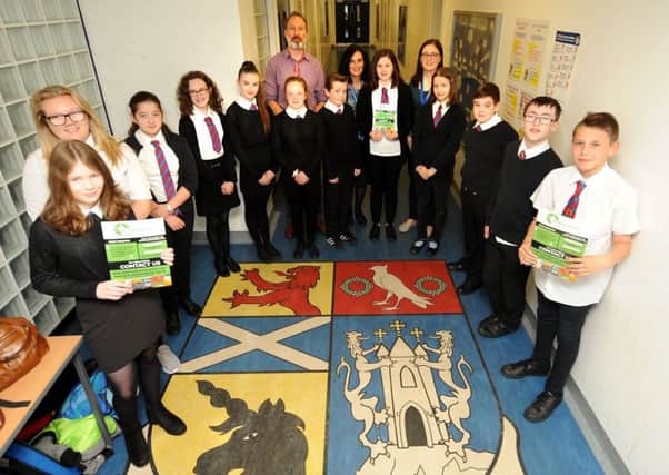 Sara Williamson with Ian Campbell and pupils. Picture: Fife Photo Agency