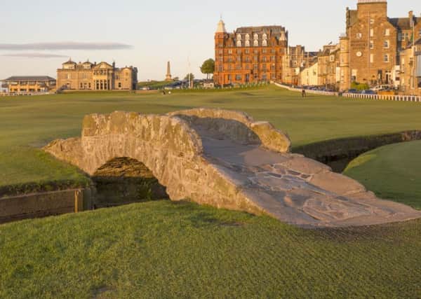 Swilcan Bridge at The Old Course, St. Andrews, which is drawing in visitors.