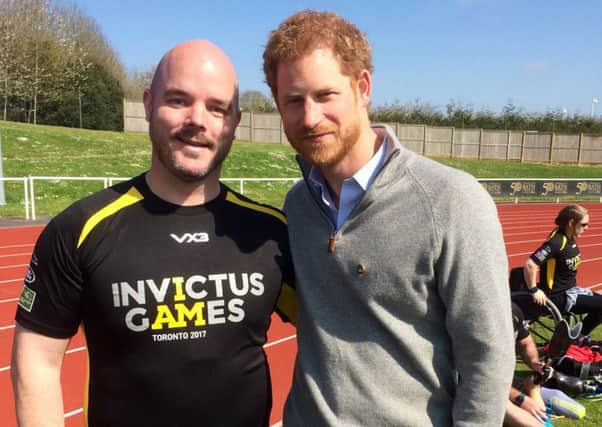 Michael Mellon from Cardenden with Prince Harry.