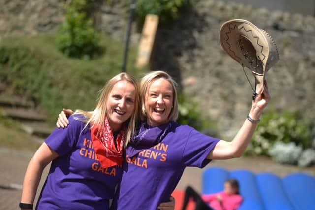 Sarah Hourston and Elaine Moncur from the committee have fun in the sun