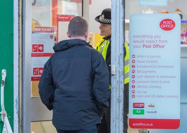 Police at Burntisland Post Office following the robbery. Pic: Steven Brown