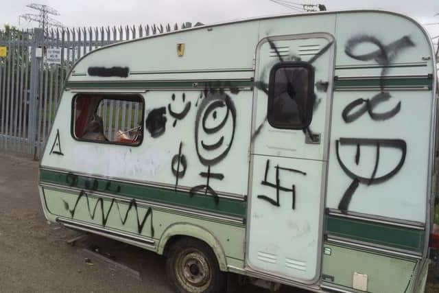 An abandoned vandalised caravan.