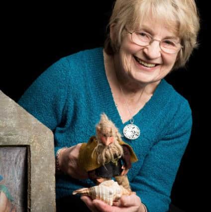 Sylvia with one of her model puppets. Pic: Alistair Kerr Photography.