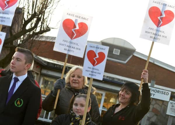 Cllrs Tom Adams and Jim Young at a protest at Mountfleurie Primary School in February. Pic George McLuskie.