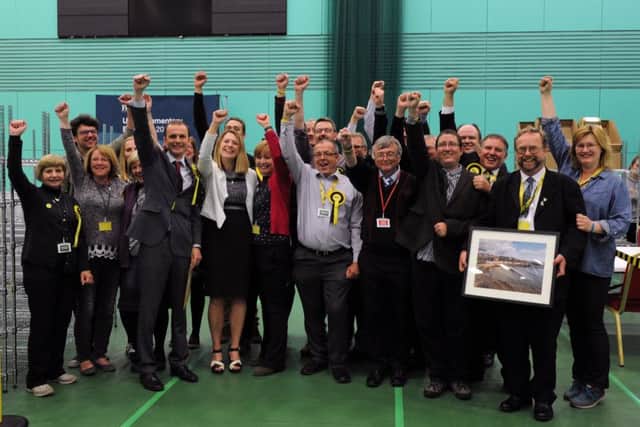 Stephen Gethins and his SNP team celebrate after a third recount saw the party win North East Fife