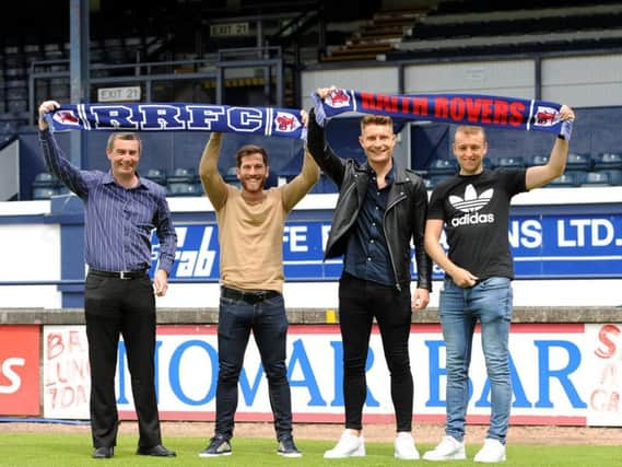 From left: Raith boss Barry Smith with new signings Liam Buchanan, Euan Murray and Greig Spence. Pic: Fife Photo Agency